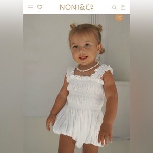 White Smocked Ruffle Baby One-Piece
